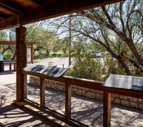 Exhibits line the porch of the visitor center